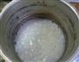 咸肉皮蛋大米粥的做法步骤8