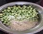 鱿鱼豌豆粥的做法图解2
