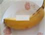 香蕉橘子奶昔的做法图解3