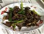 蒜苗炒飞鸟干的做法图解1