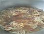 东北酸菜炖猪肉粉条的做法图解6