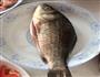 西红柿鲫鱼汤的做法图解1